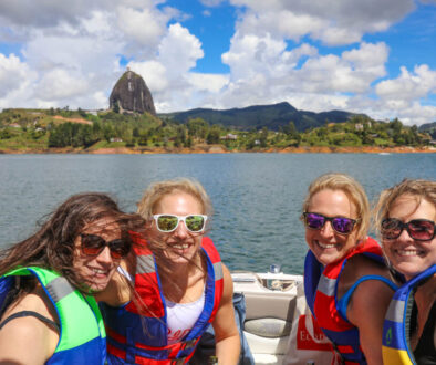 four girls on a boat in lake guatapé