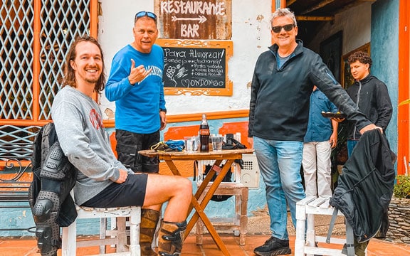 3 men at a small town Colombian cafe