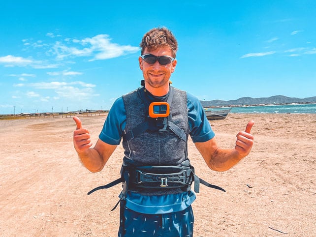 Man giving 2 thumbs up in the desert during kite trip Colombia