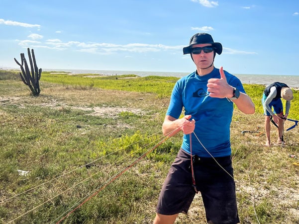 Man gives a thumbs up during kite trip colombia