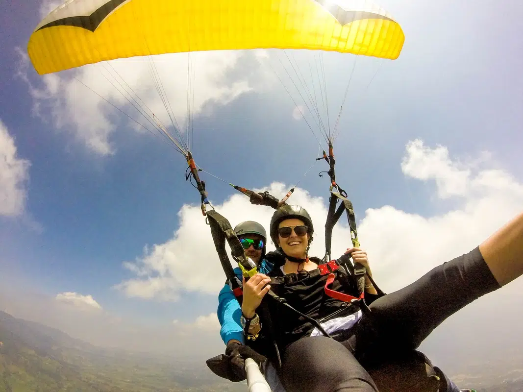 Paragliding over Medellín valley — unique things to do in Medellín with Guanabana Tours