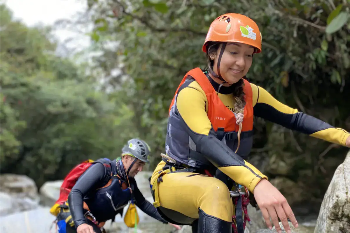 Young woman doing canyoning in Medellin